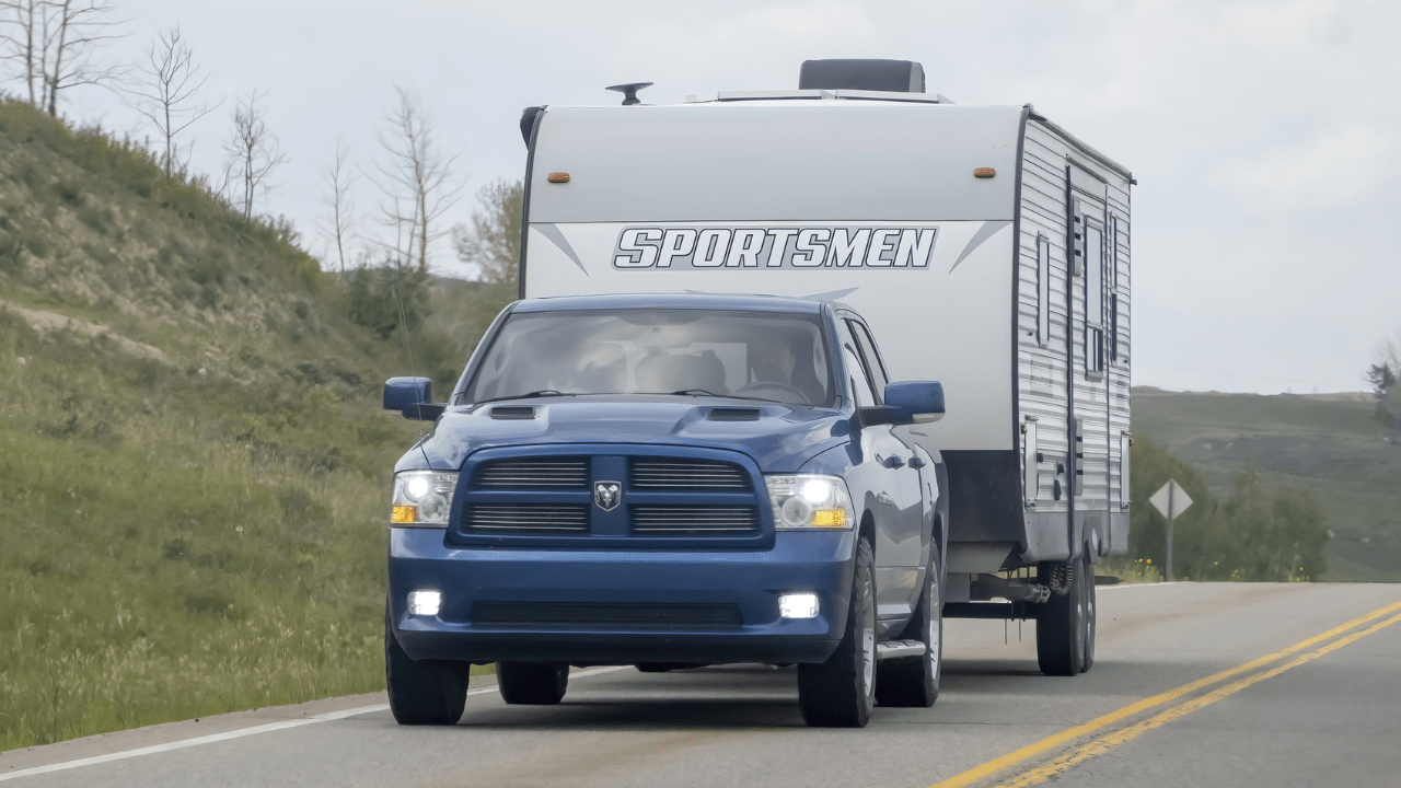 A truck towing an RV
