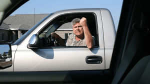 A man showing road rage