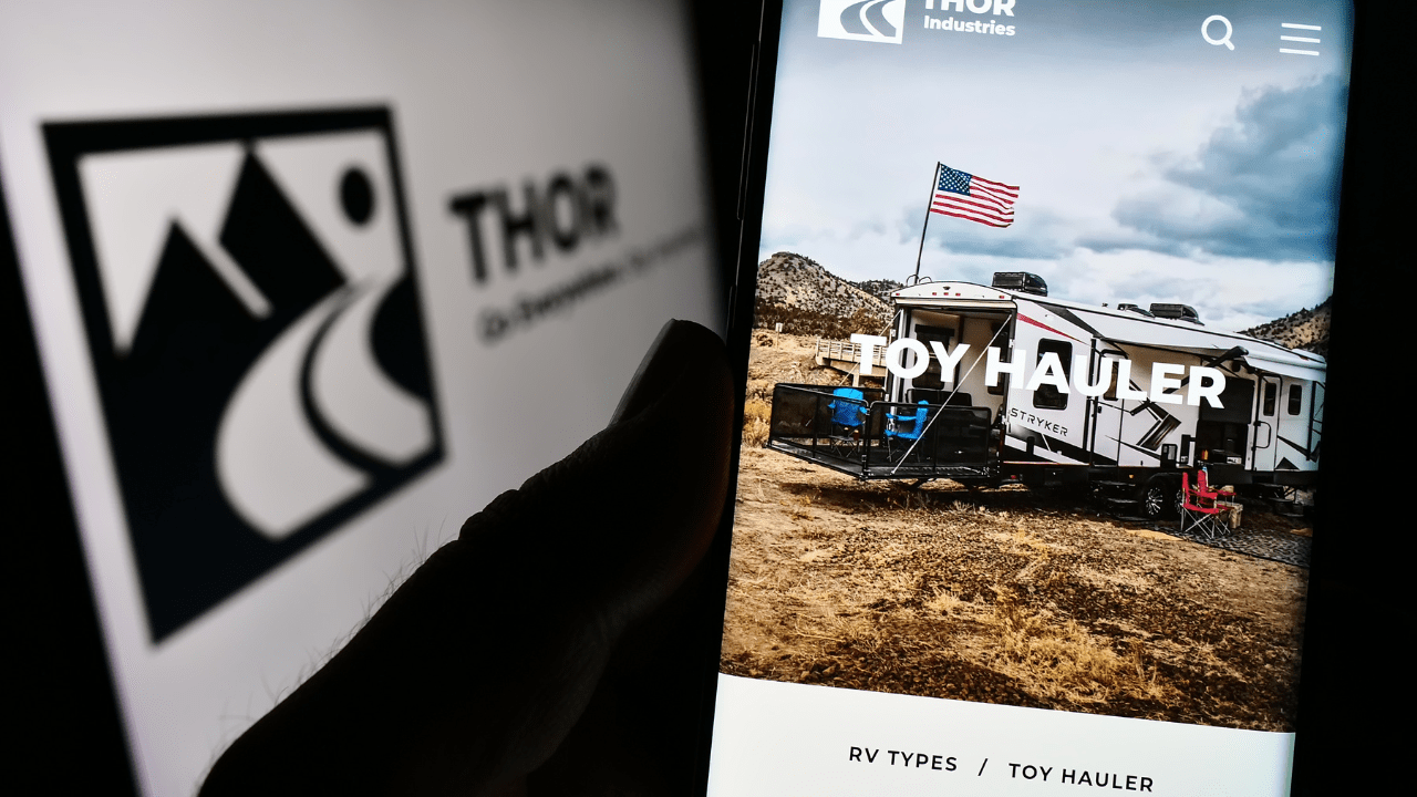 A man looking at an RV manufacturer website