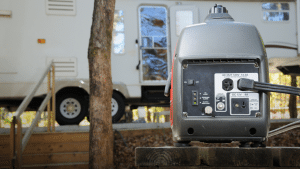 A portable generator running at a campsite