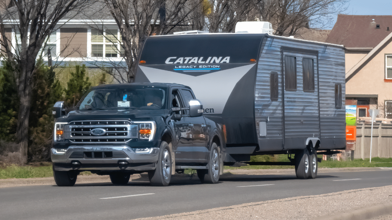 A truck pulling a travel trailer