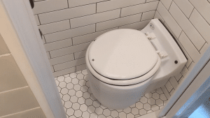 A Laveo Dry Flush toilet from Going Bondless on YouTube