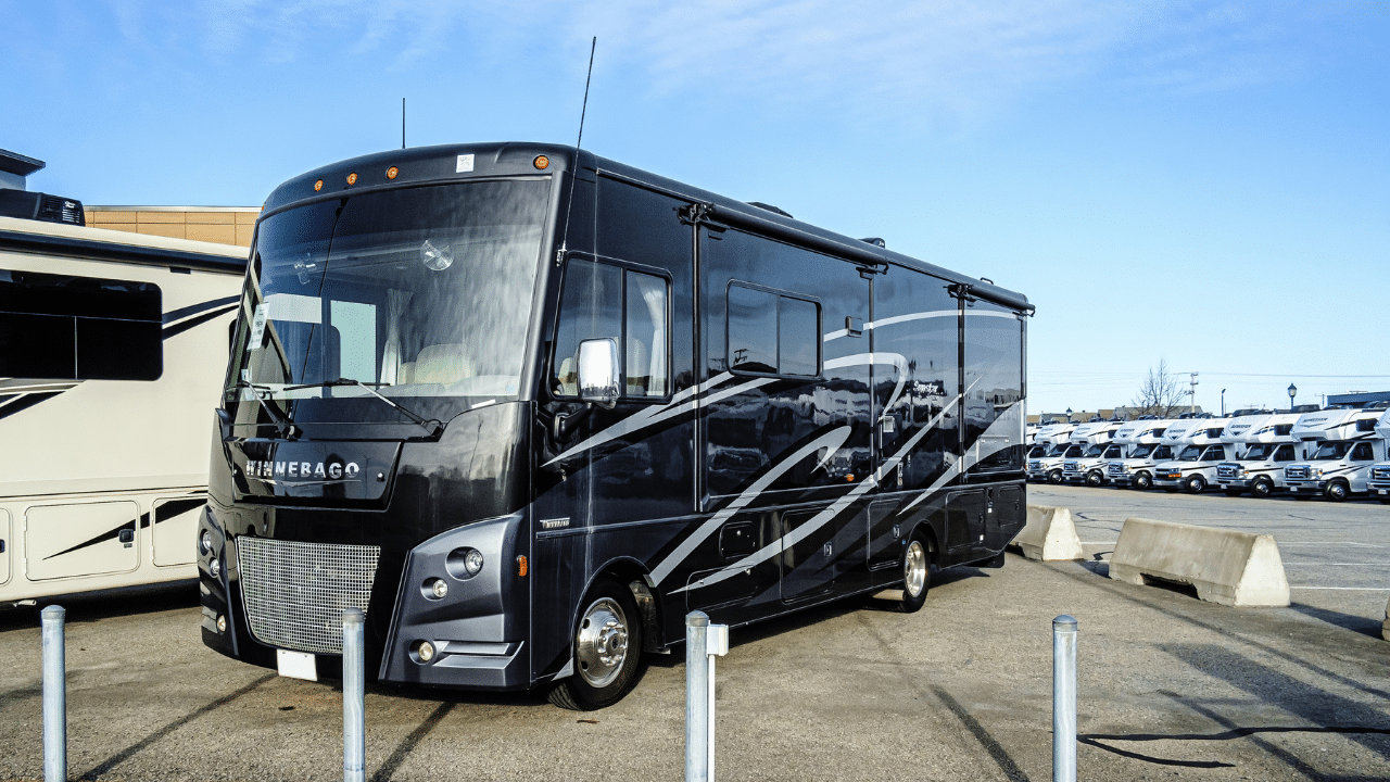 A Winnebago motorhome on a dealer lot