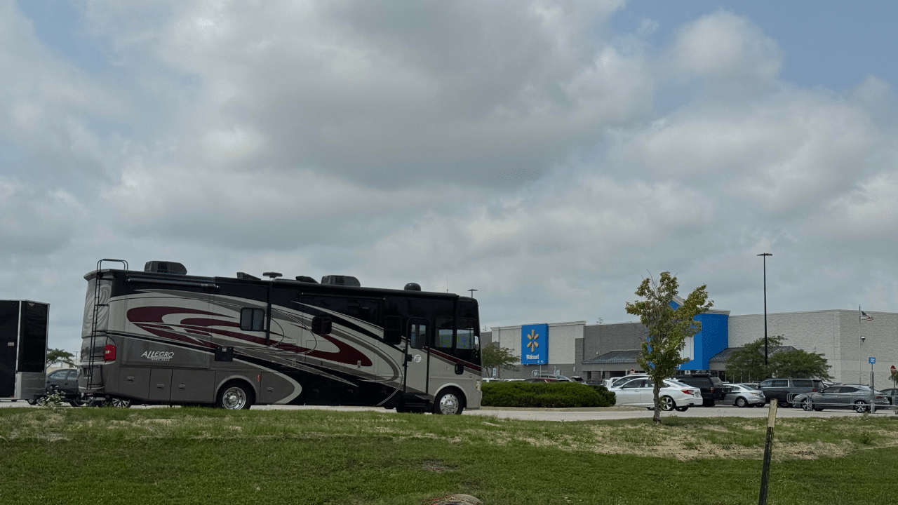 A motorhome overnighting at a Walmart_CamperFAQs
