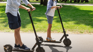 People riding on electric scooters