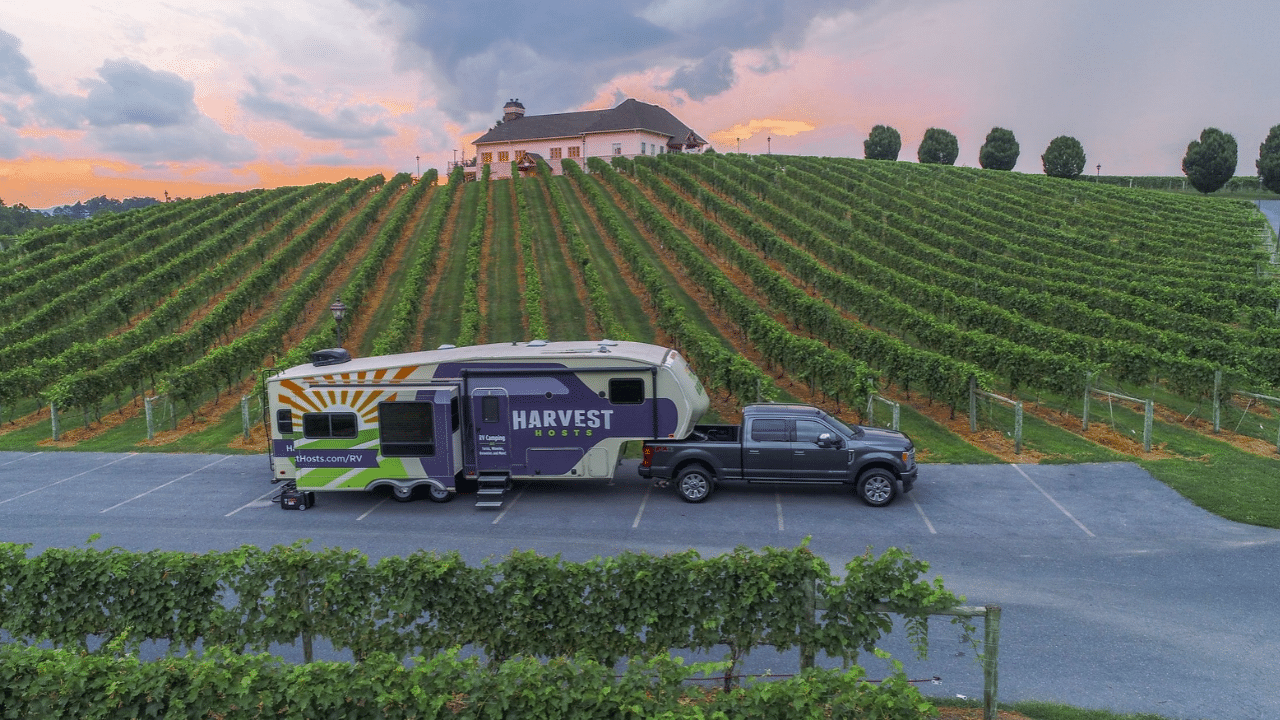 A truck and travel trailer at a winery