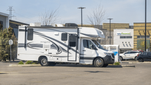 A Class-C RV parked in a parking lot