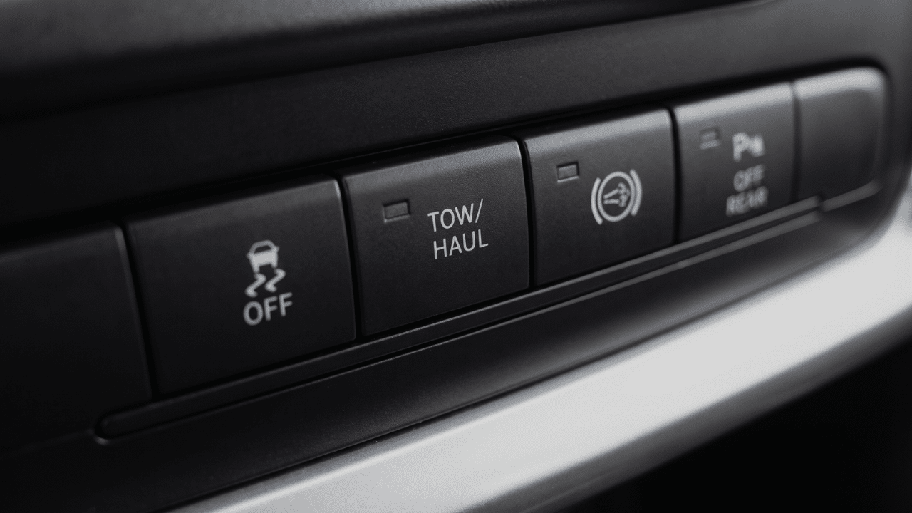 The tow haul mode button in a pickup truck